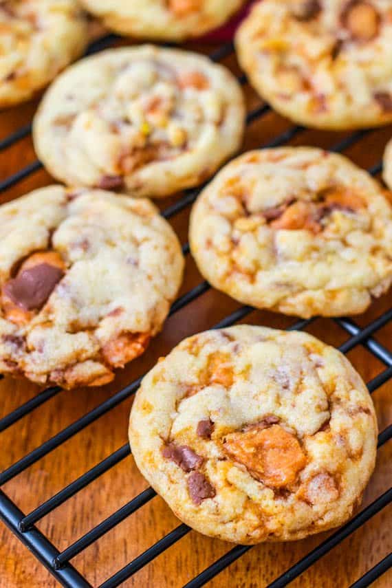 The BEST and easiest cookie recipe - filled with Butterfingers. Chewy and delicious!
