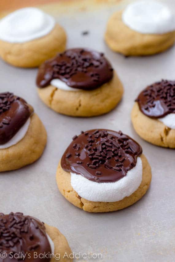 Soft-baked, thick style peanut butter cookies topped with melty marshmallow and chocolate. Bring campfire s'mores inside!