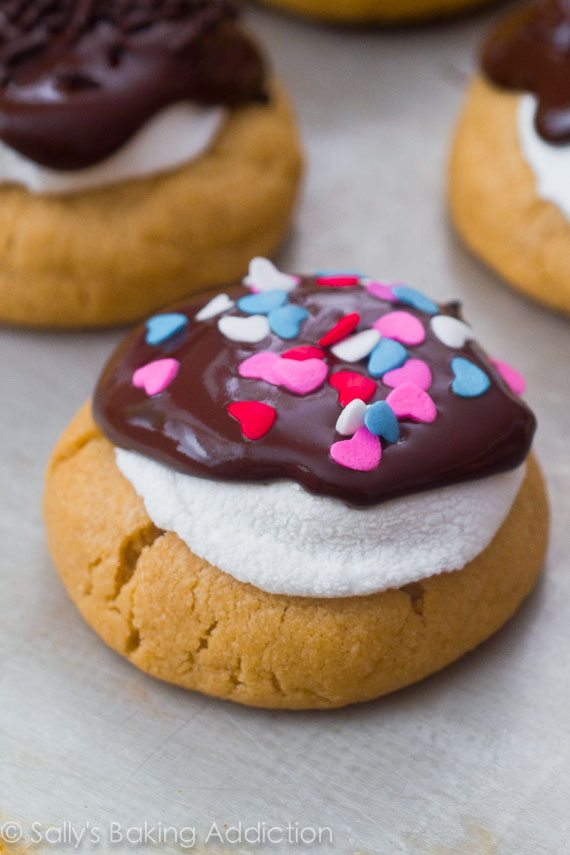 Soft-baked, thick style peanut butter cookies topped with melty marshmallow and chocolate. Bring campfire s'mores inside!
