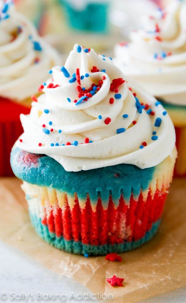 red white and blue cupcakes with icing