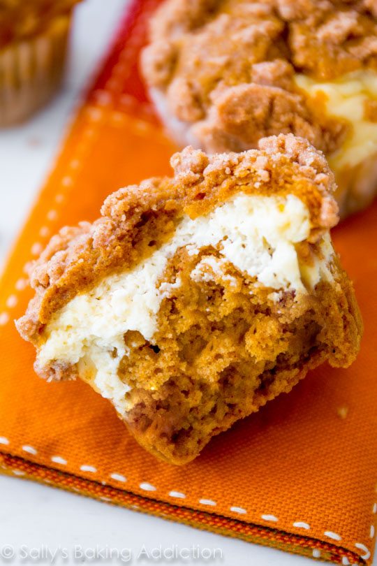 Pumpkin muffins filled with cream cheese filling and topped with sweet cinnamon brown sugar streusel!