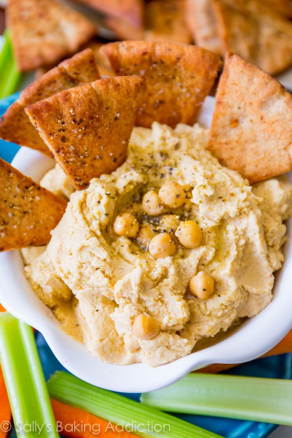 Homemade Hummus with Crunchy Spiced Pita Chips. This is my favorite (super simple) homemade hummus recipe, you will make it time and time again!