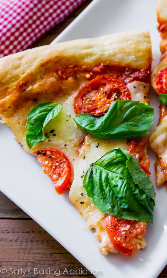 Sometimes you just can't beat a classic like fresh and simple Margherita Pizza. This homemade pizza crust with fresh toppings hits the spot!