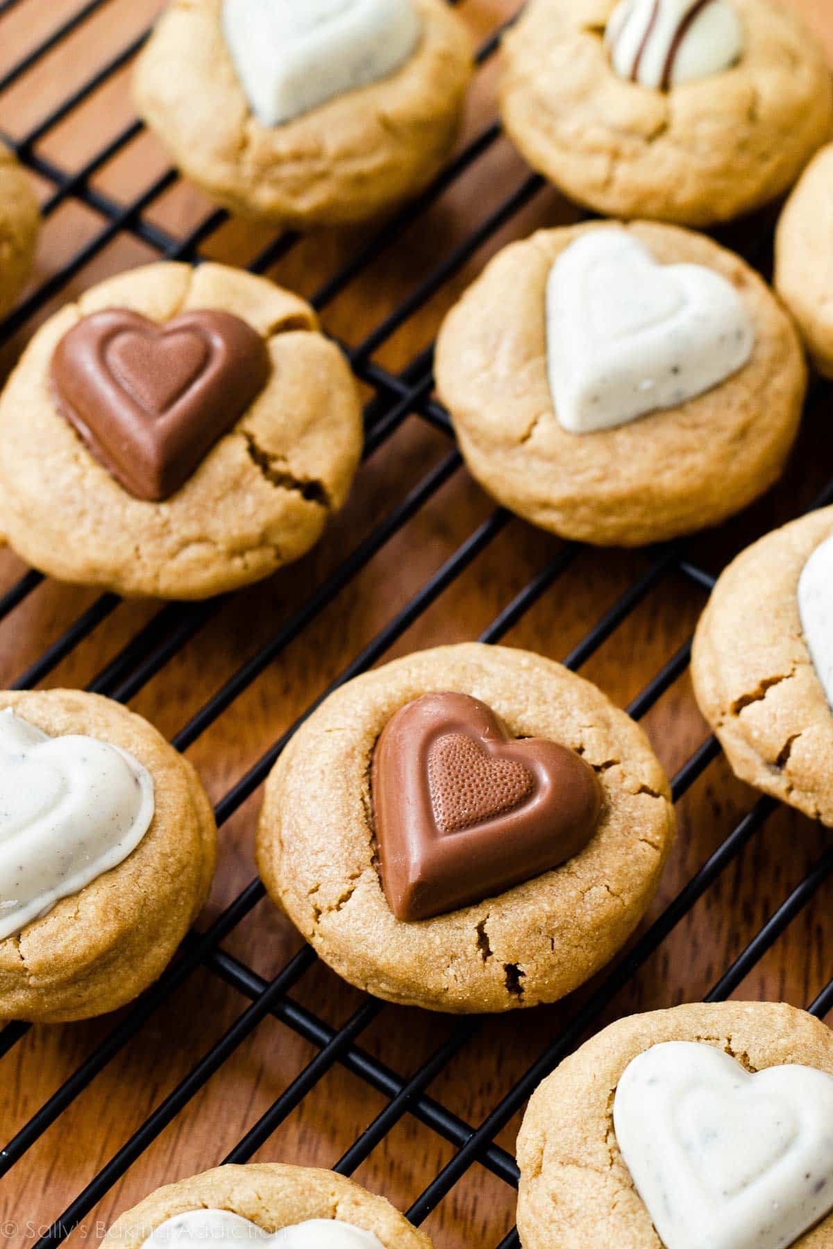 peanut butter blossom cookies with chocolate hearts.