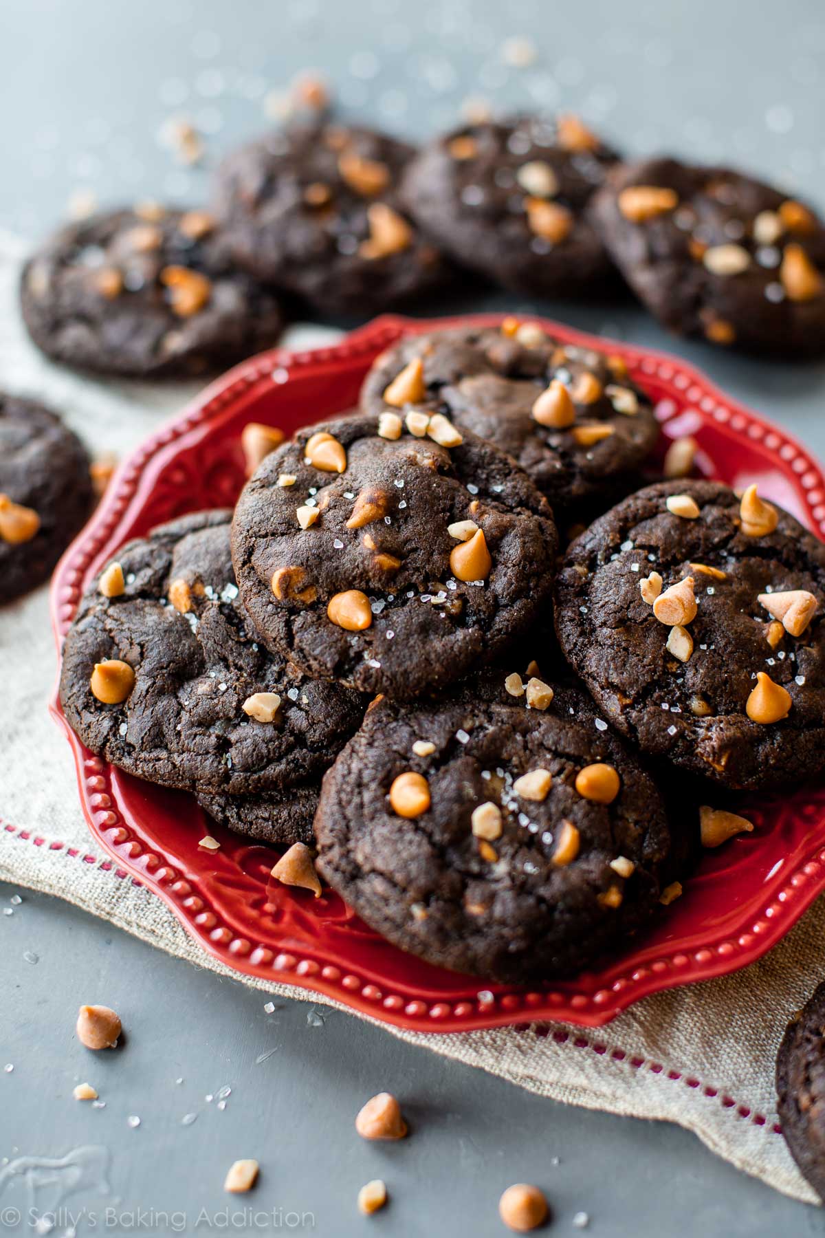 Butterscotch toffee fudge chocolate cookies on a red plate
