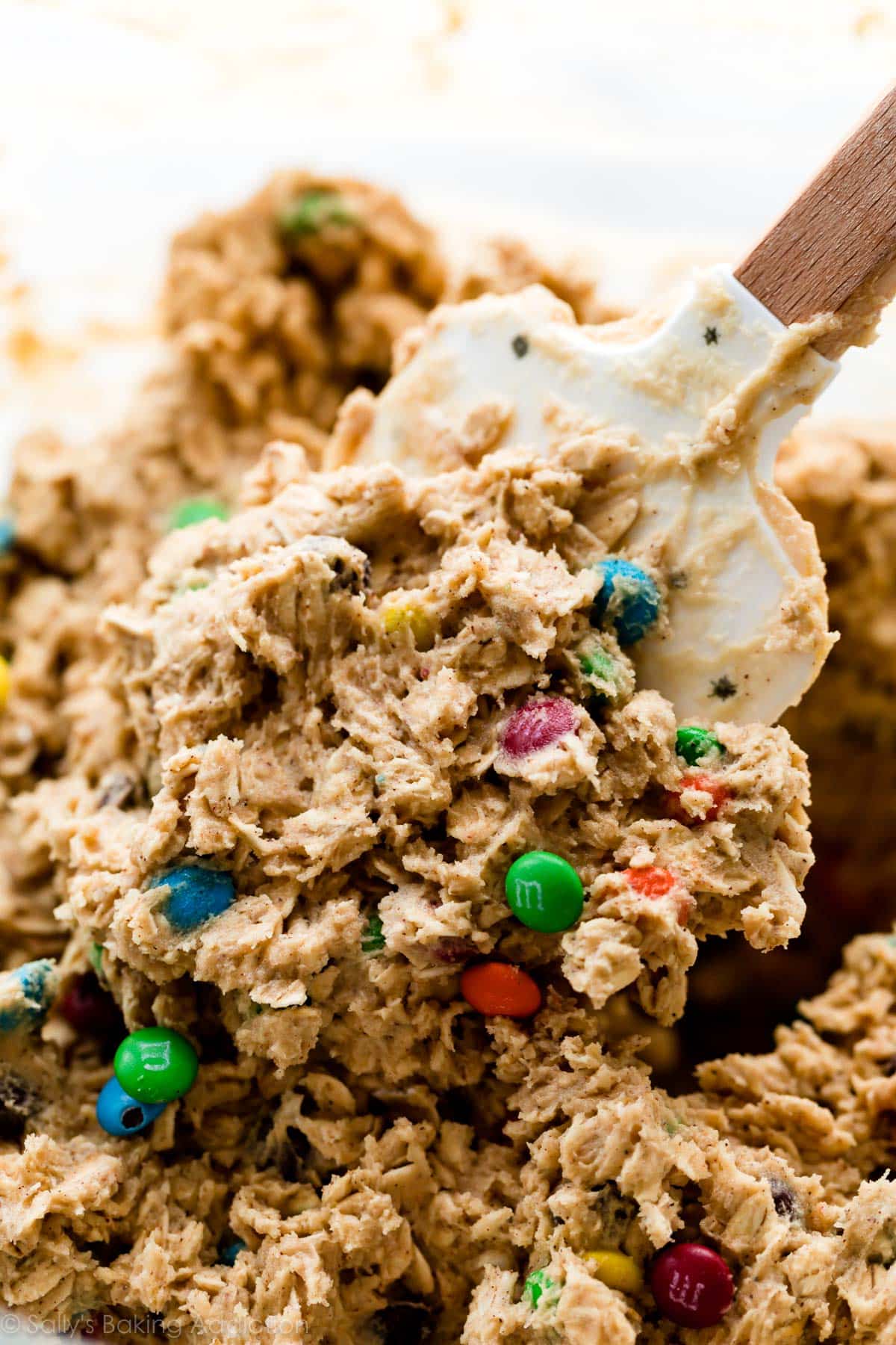 oatmeal M&M cookie dough with a spatula