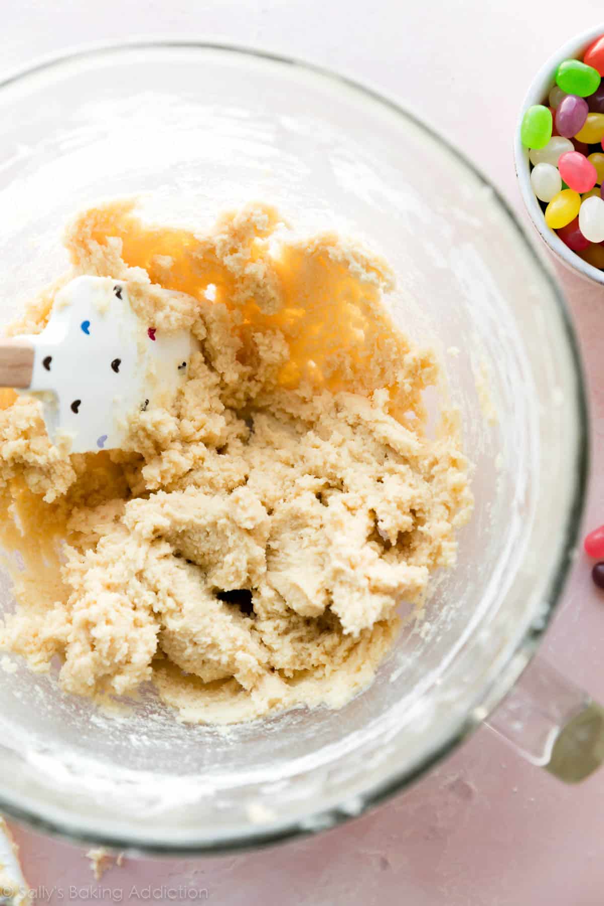 Sugar cookie dough in glass mixing bowl