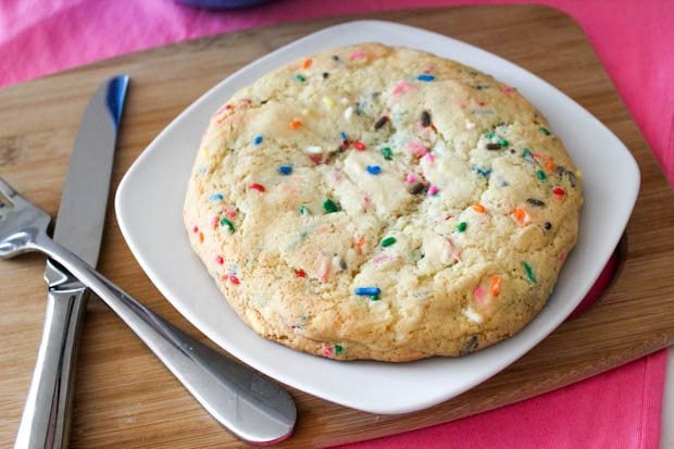 one giant sugar cookie with sprinkles