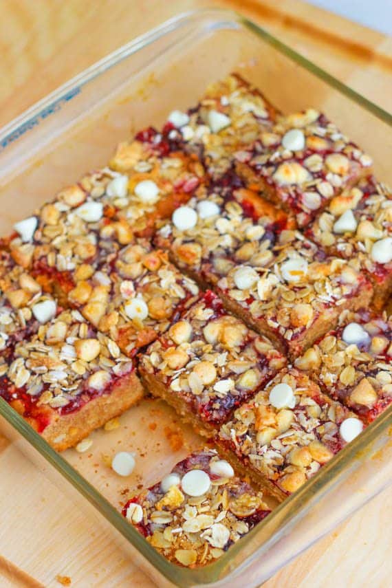 peanut butter and jelly white chocolate bars in a glass baking dish