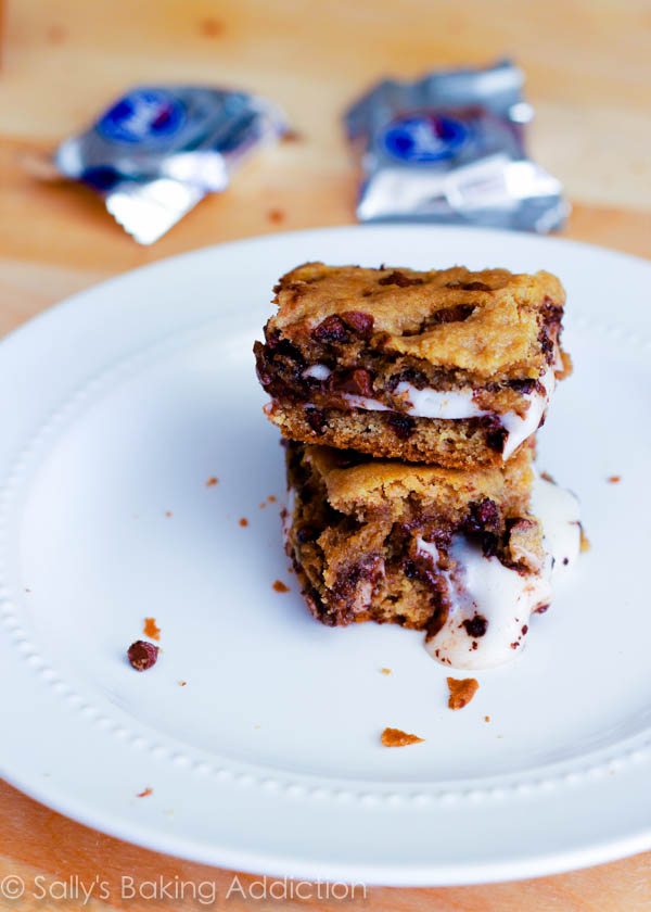 stack of chocolate chip cookie bars stuffed with York Peppermint Patties on a white plate