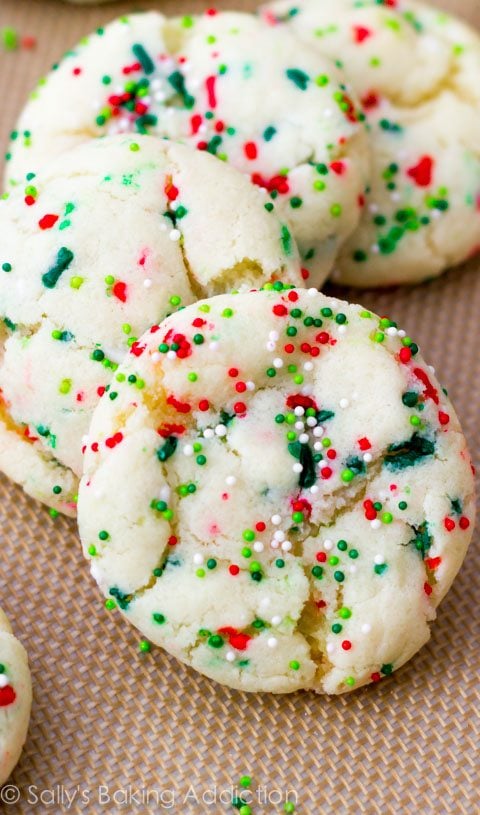 christmas confetti cake mix cookies on a silpat baking mat