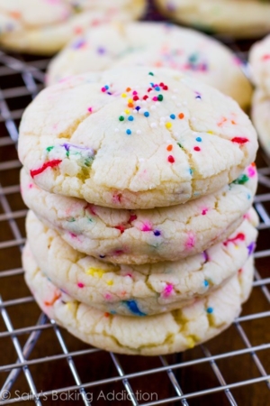 stack of confetti cake batter cookies on a cooling rack
