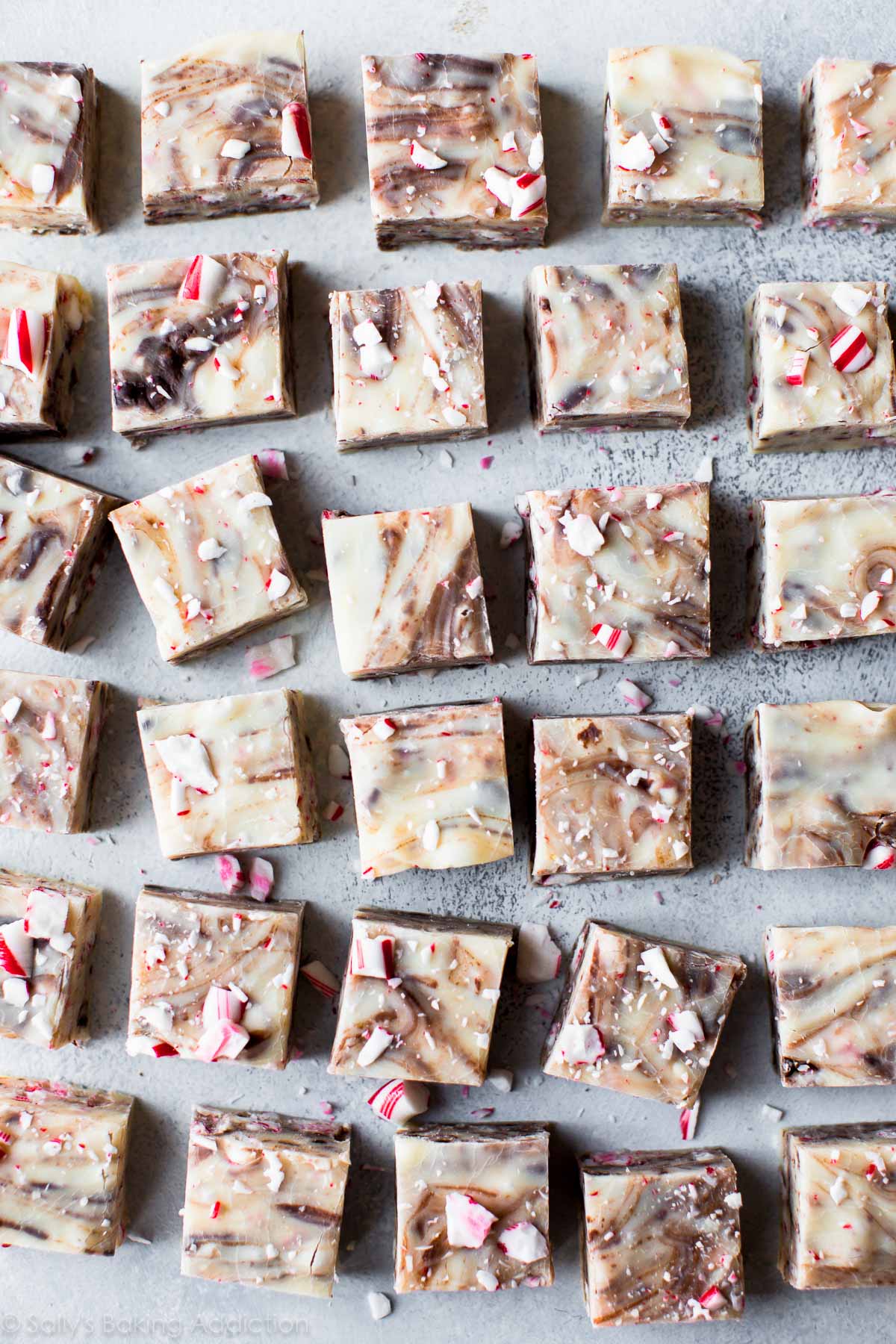 overhead image of squares of candy cane chocolate swirl fudge