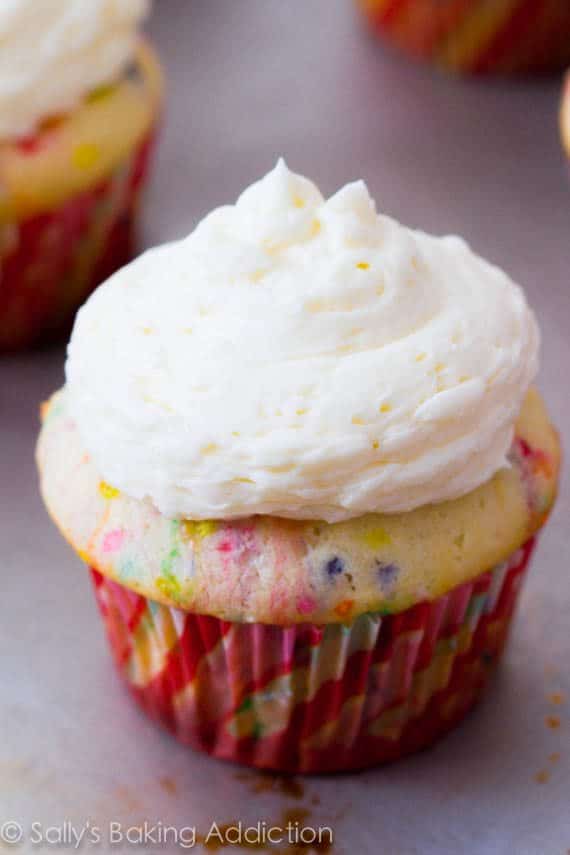 funfetti cupcakes topped with vanilla buttercream