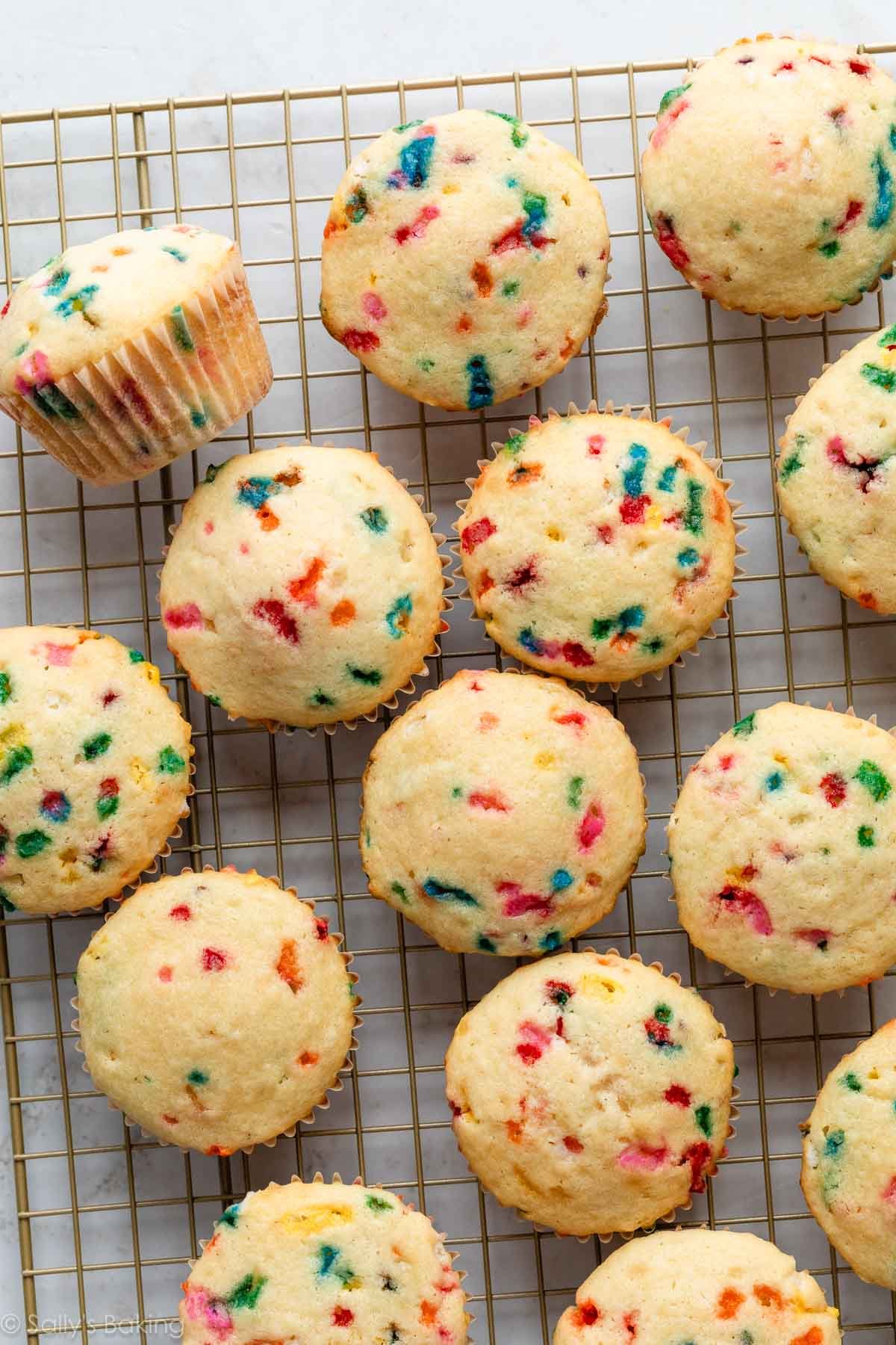 funfetti cupcakes on cooling rack.