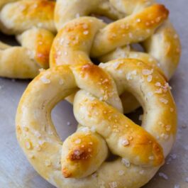 soft pretzels on a baking sheet