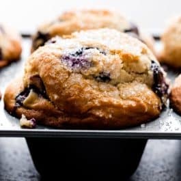 jumbo blueberry muffins in a muffin pan