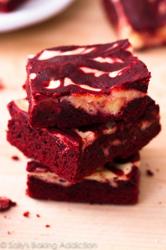 stack of red velvet cheesecake swirl brownies