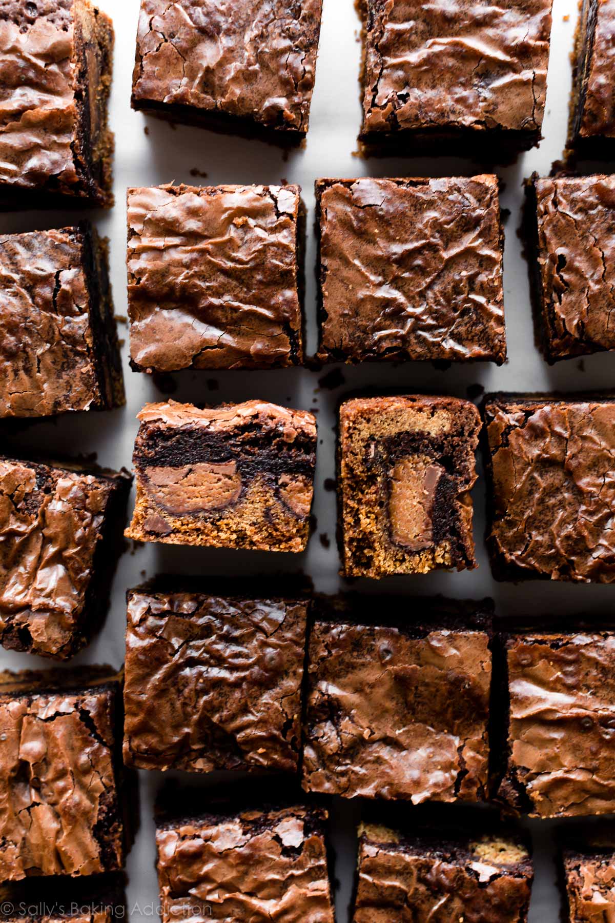 Chocolate chip cookie brownie bars cut into squares
