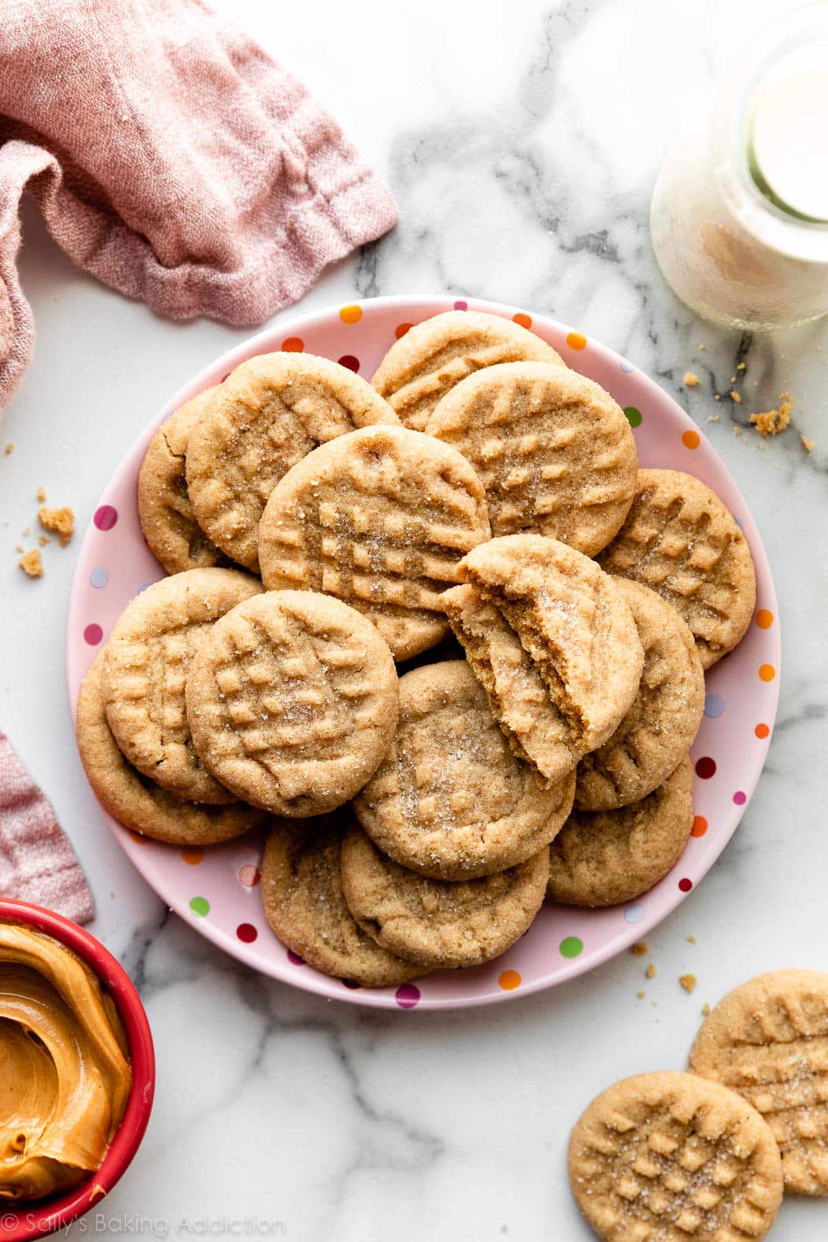 Peanut butter cookies on a pink dotted plate