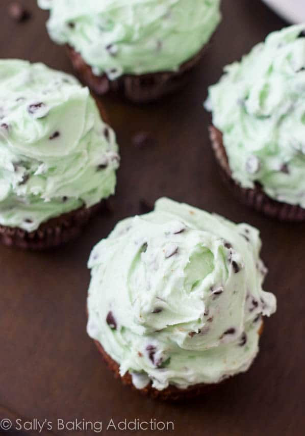 overhead image of chocolate cupcakes topped with mint chip frosting
