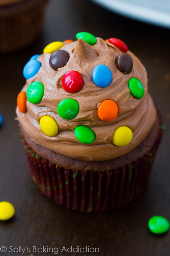 chocolate cupcake topped with Nutella frosting and M&Ms