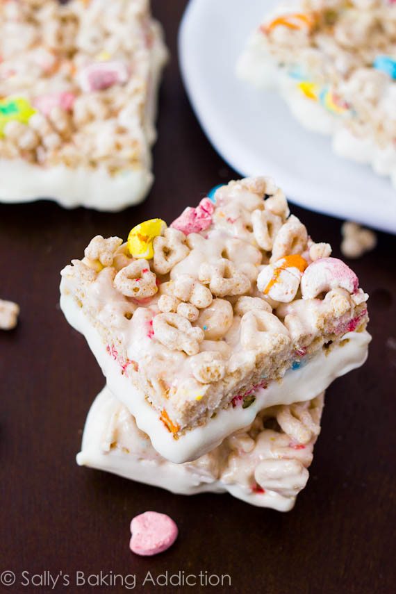 stack of 2 Lucky Charms Treats with the bottoms dipped in white chocolate
