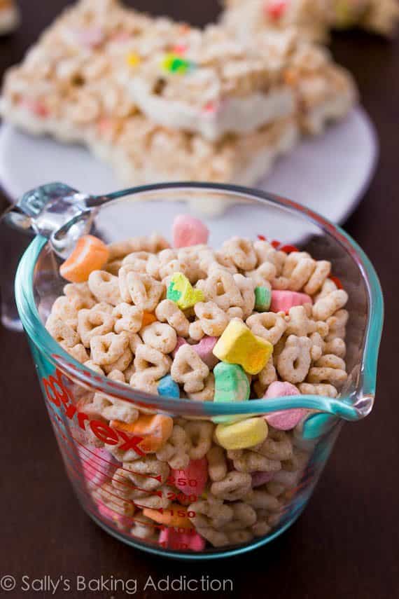 Lucky Charms cereal in a glass measuring cup