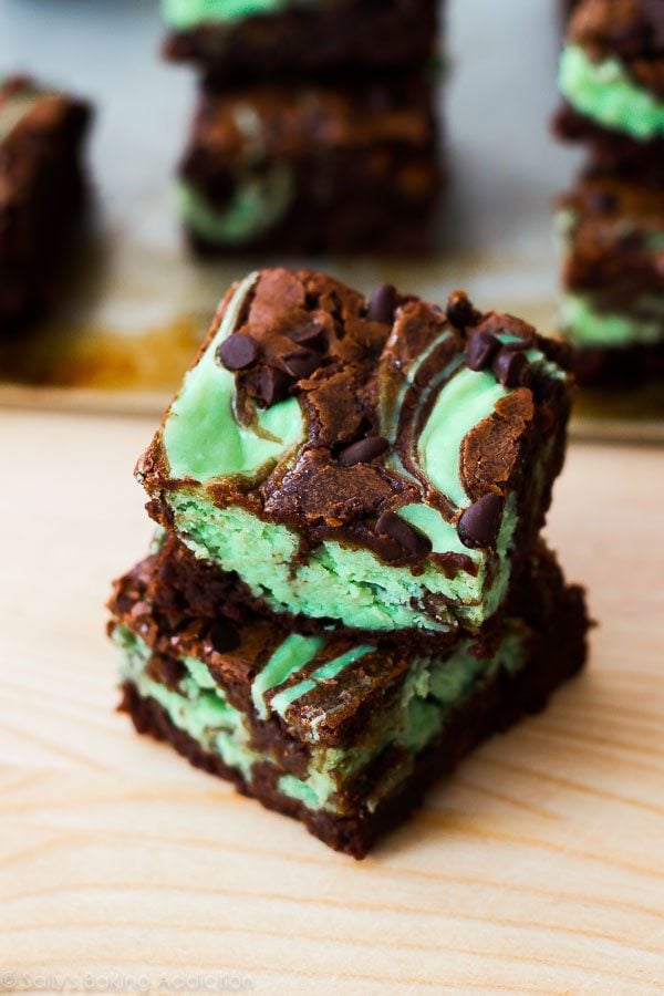 stack of mint chocolate chip cheesecake brownies