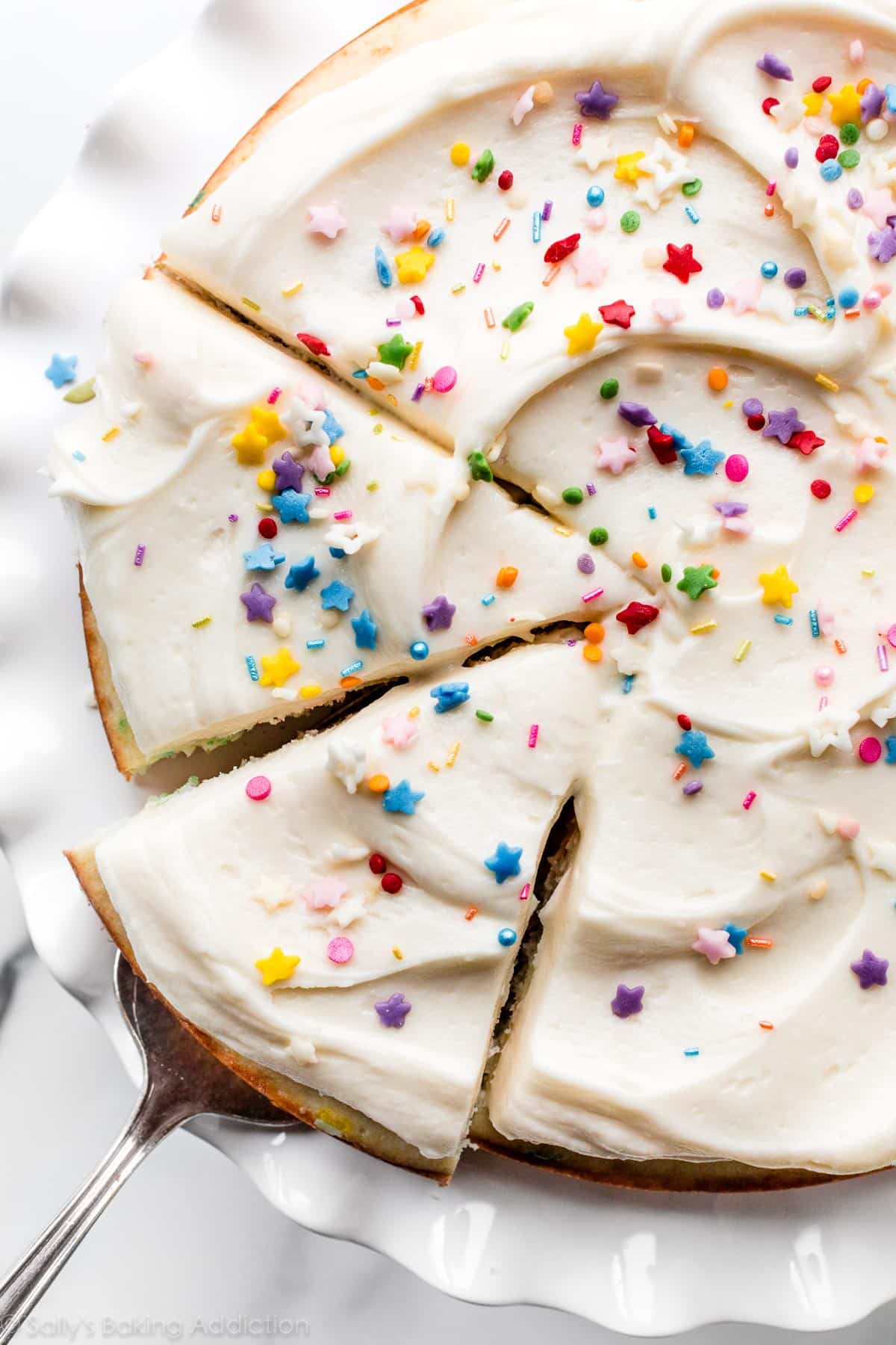 one layer sprinkle cake with vanilla frosting