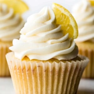 lemon cupcake topped with vanilla buttercream and a lemon slice