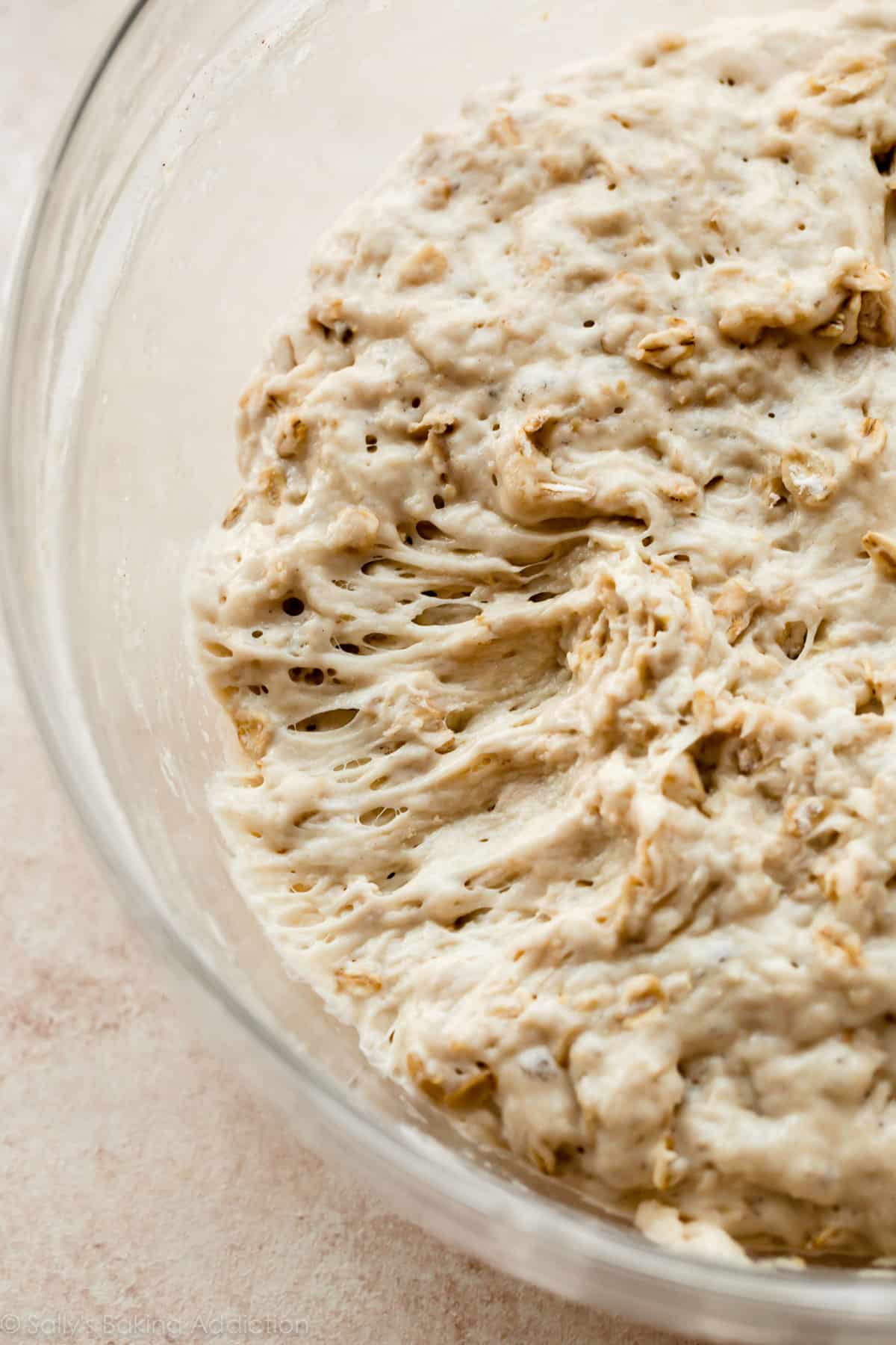 close-up photo showing no knead honey oat bread dough