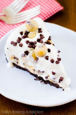 slice of chocolate chip cookie dough ice cream pie on a white plate