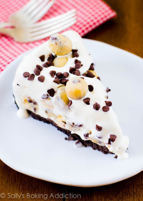 slice of chocolate chip cookie dough ice cream pie on a white plate