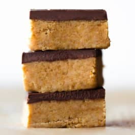 stack of no bake chocolate peanut butter bars