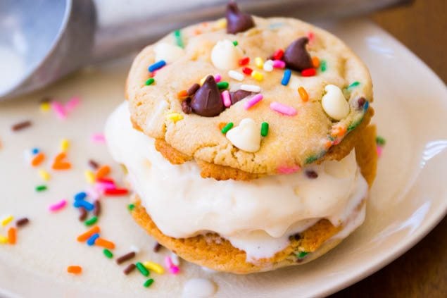 cake batter cookie ice cream sandwich on a white plate