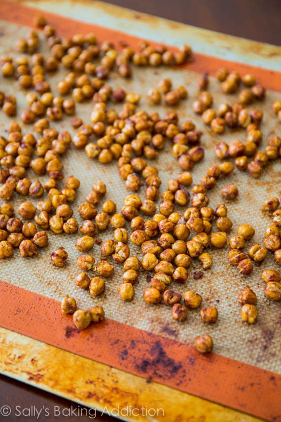 cinnamon sugar roasted chickpeas on a silpat baking mat