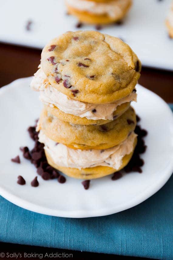 stack of 2 chocolate chip cookie dough sandwiches on a white plate