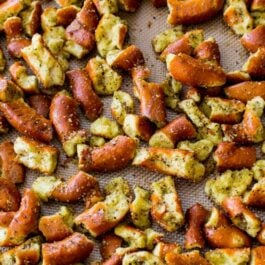 seasoned pretzels on a silpat baking mat