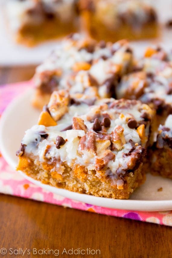 ultimate magic cookie bars on a white plate