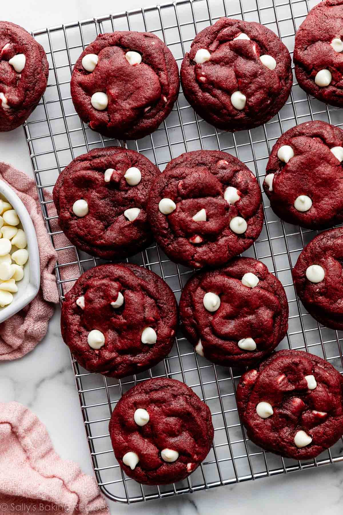 white chocolate red velvet cake cookies on cooling rack.