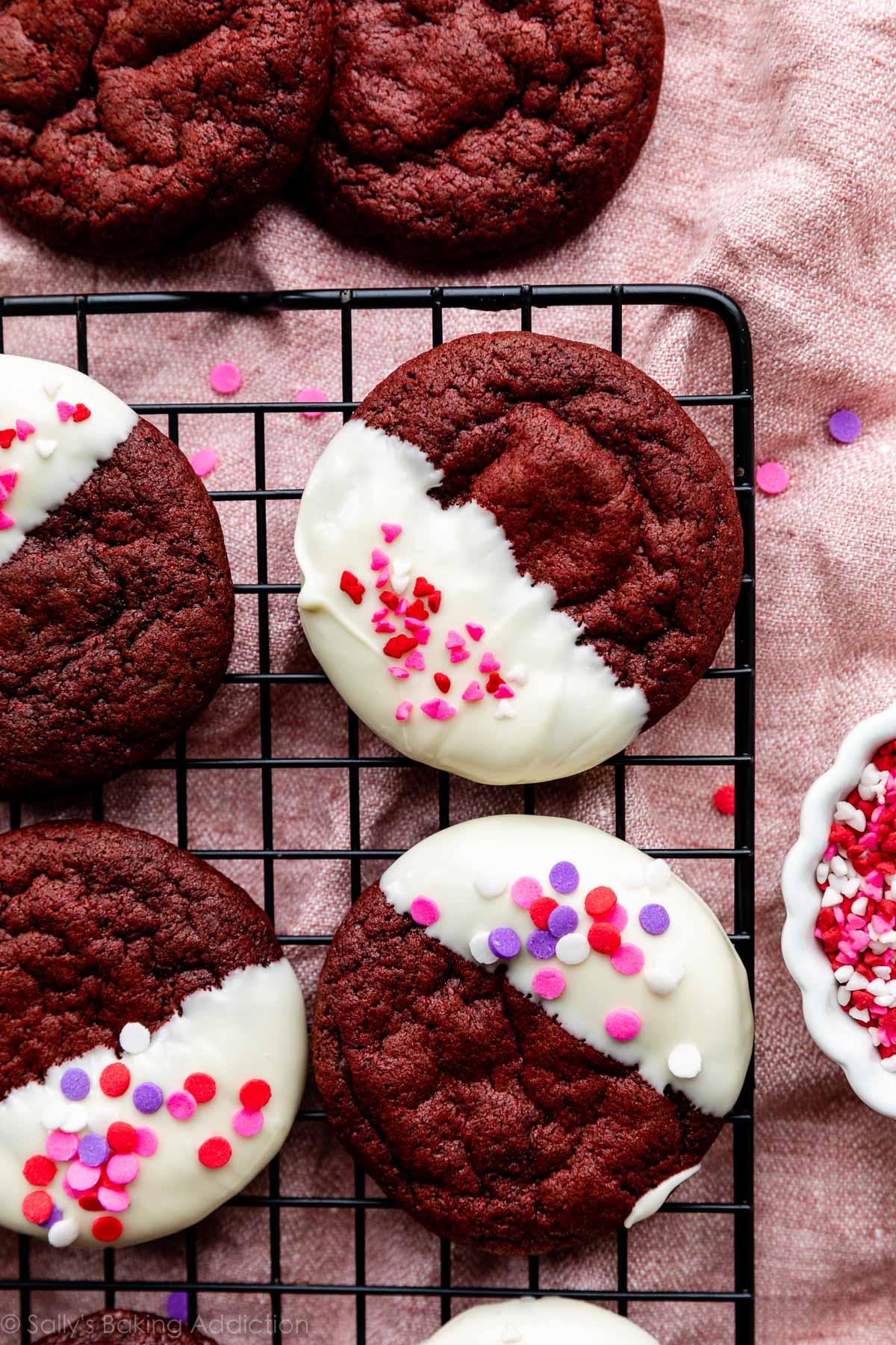 white chocolate dipped red velvet cookies