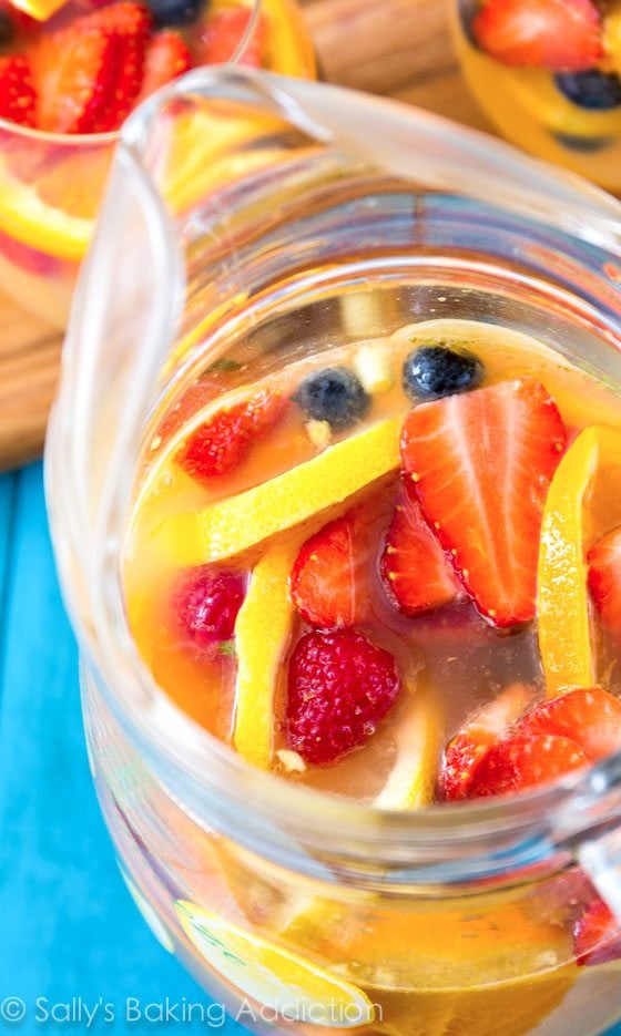 sparkling champagne sangria in a glass pitcher