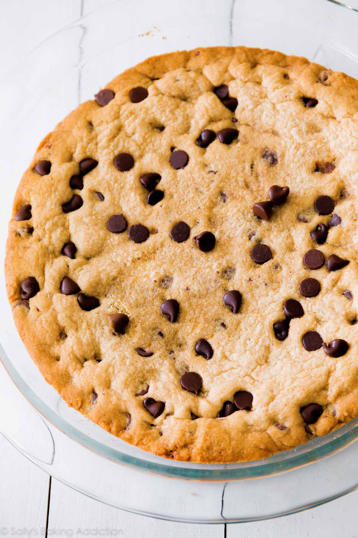 chocolate chip cookie cake in a glass baking dish
