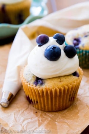 cream cheese frosting on blueberries and cream cupcake