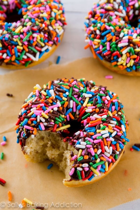 chocolate frosted donuts topped with sprinkles