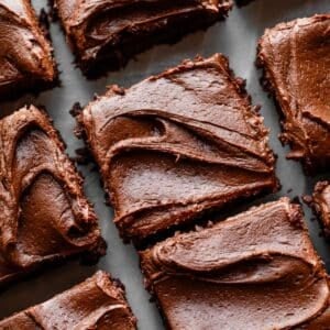 brownies with frosting cut into squares.