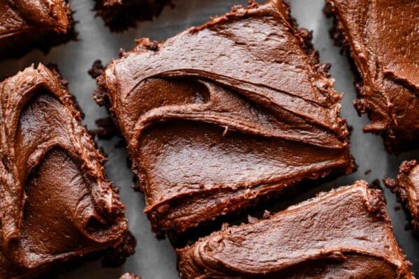 brownies with frosting cut into squares.