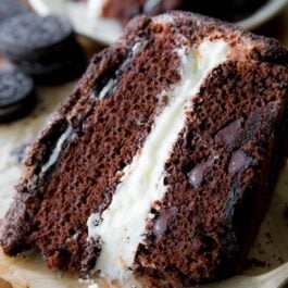 slice of Oreo layer cake with a fork