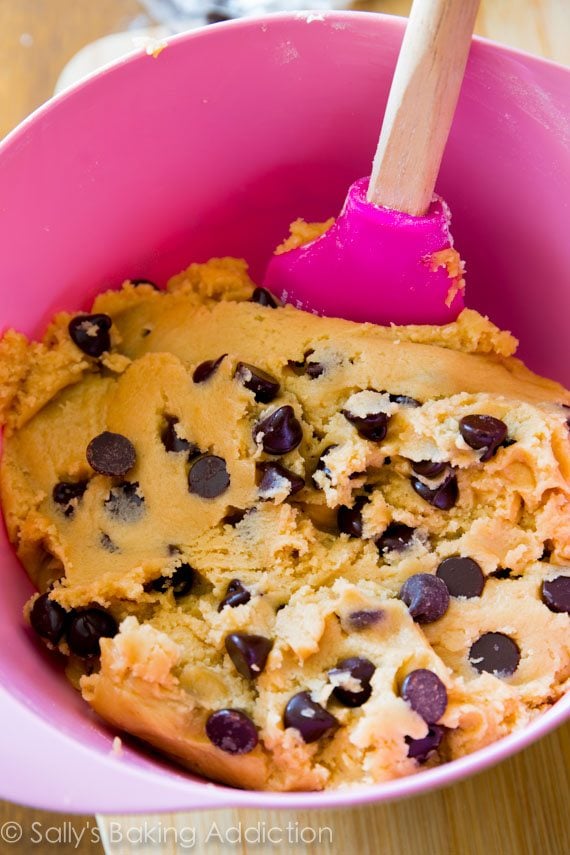 chocolate chip cookie dough in a pink bowl